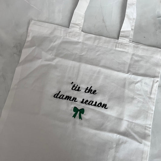 Tis the damn season tote bag