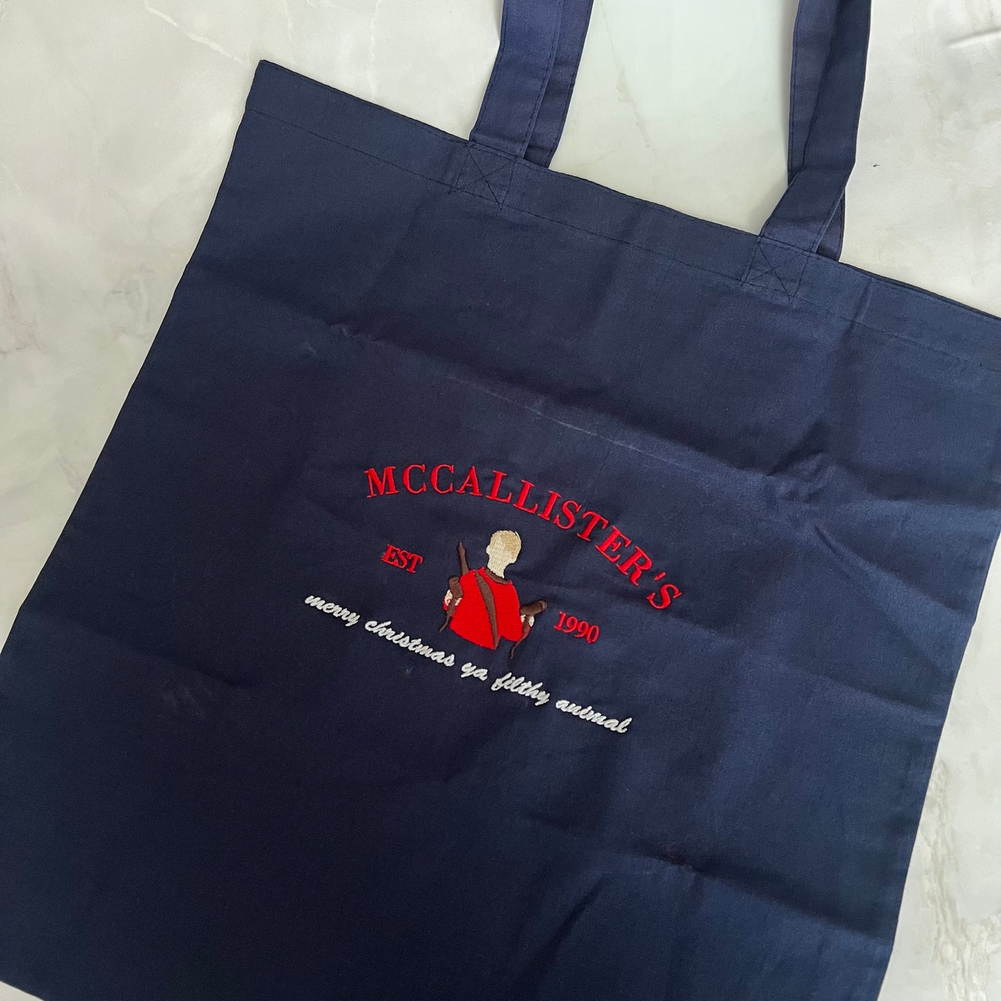 Home alone tote bag