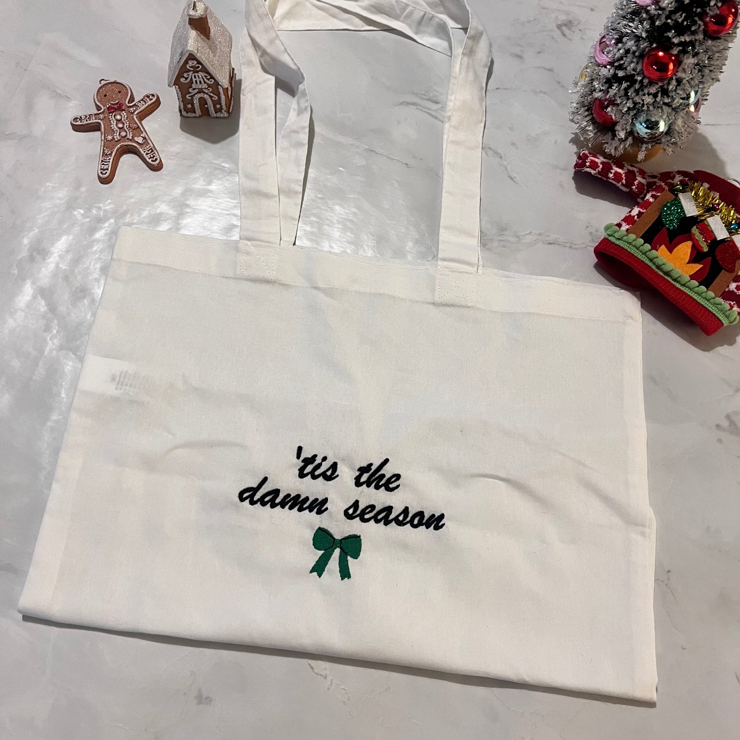 Tis the damn season tote bag